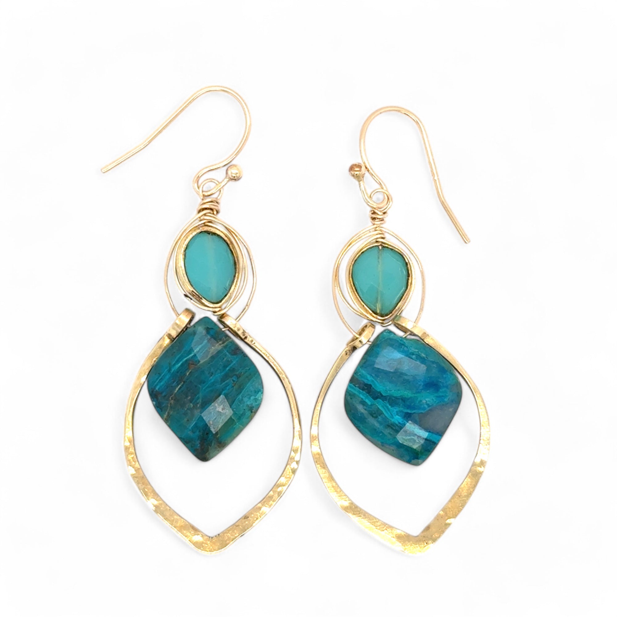 A pair of gold-colored brass earrings with a double drop design, featuring blue green chrysocolla marquise gemstones and chalcedony wrapped in gold filled wire