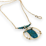 Brass circular pendant with square top chrysocolla drop, green apatite, and faceted chrysocolla gemstones on gold filled wire and chain necklace