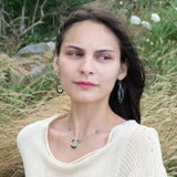 Mini sterling silver horseshoe shaped pendant filled with emerald, amazonite, blue tourmaline, and green amethyst gemstones, with a gold filled and sterling dot chain with pyrite accents necklace