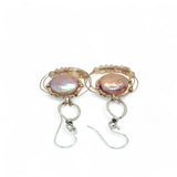 pink fresh water pearl coins are held in bronze rings on hammered sterling silver drops with rings of gold filled wire holding pink opal and peach cat's eye gemstone earrings