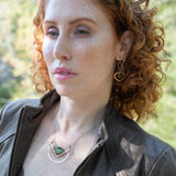 Leaf stamped sterling silver bowl shaped pendant with bronze v shape accents. A fan shaped flashy labradorite gemstone with fresh water pearl and micro-faceted gemstones and a sterling silver chain