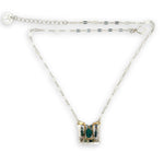 Sterling silver and brass hammered mini pendant holding green onyx and fancy jasper faceted gemstones on a sterling silver tube chain necklace