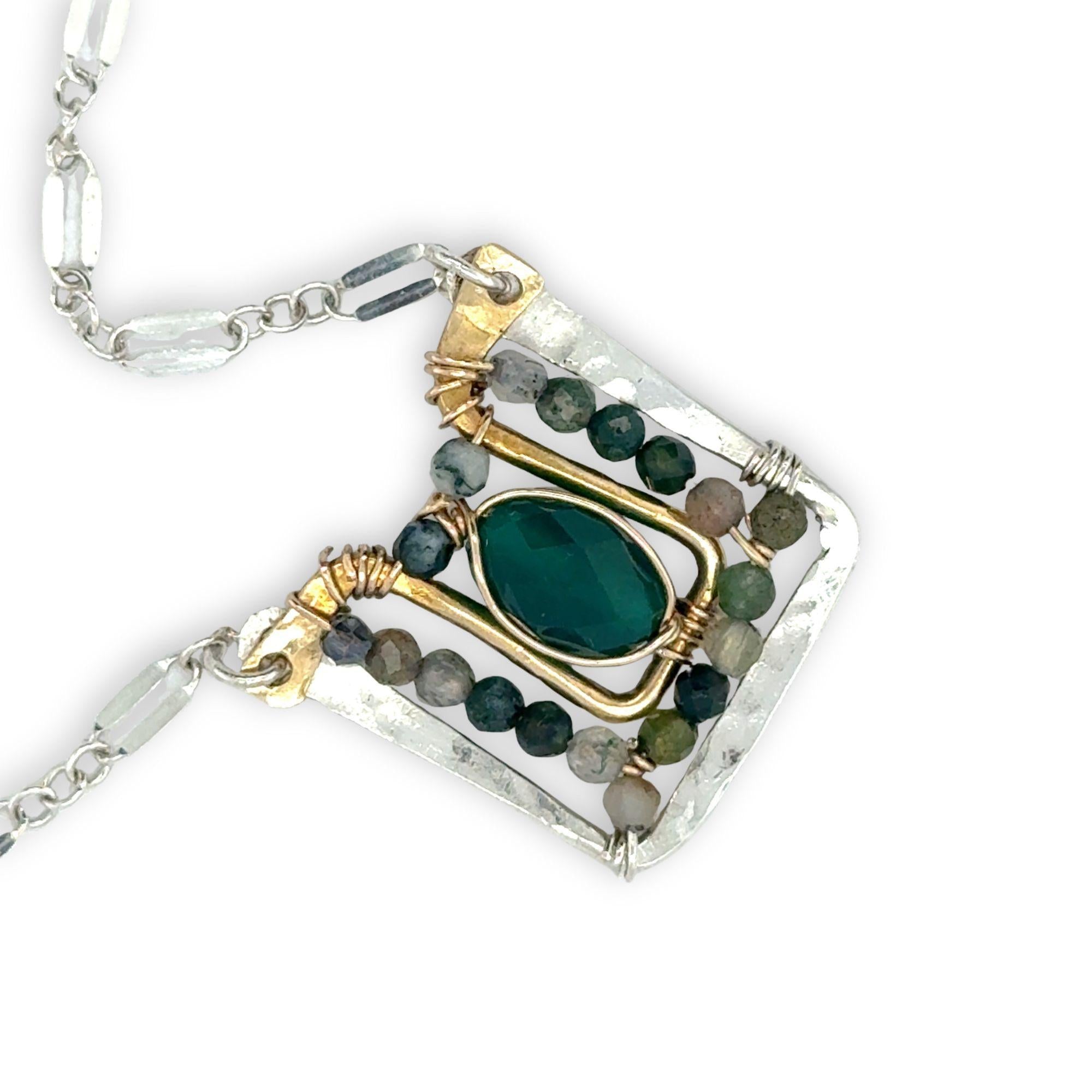 Sterling silver and brass hammered mini pendant holding green onyx and fancy jasper faceted gemstones on a sterling silver tube chain necklace