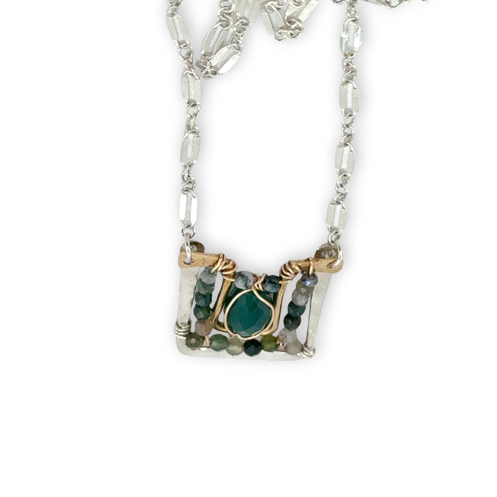 Sterling silver and brass hammered mini pendant holding green onyx and fancy jasper faceted gemstones on a sterling silver tube chain necklace