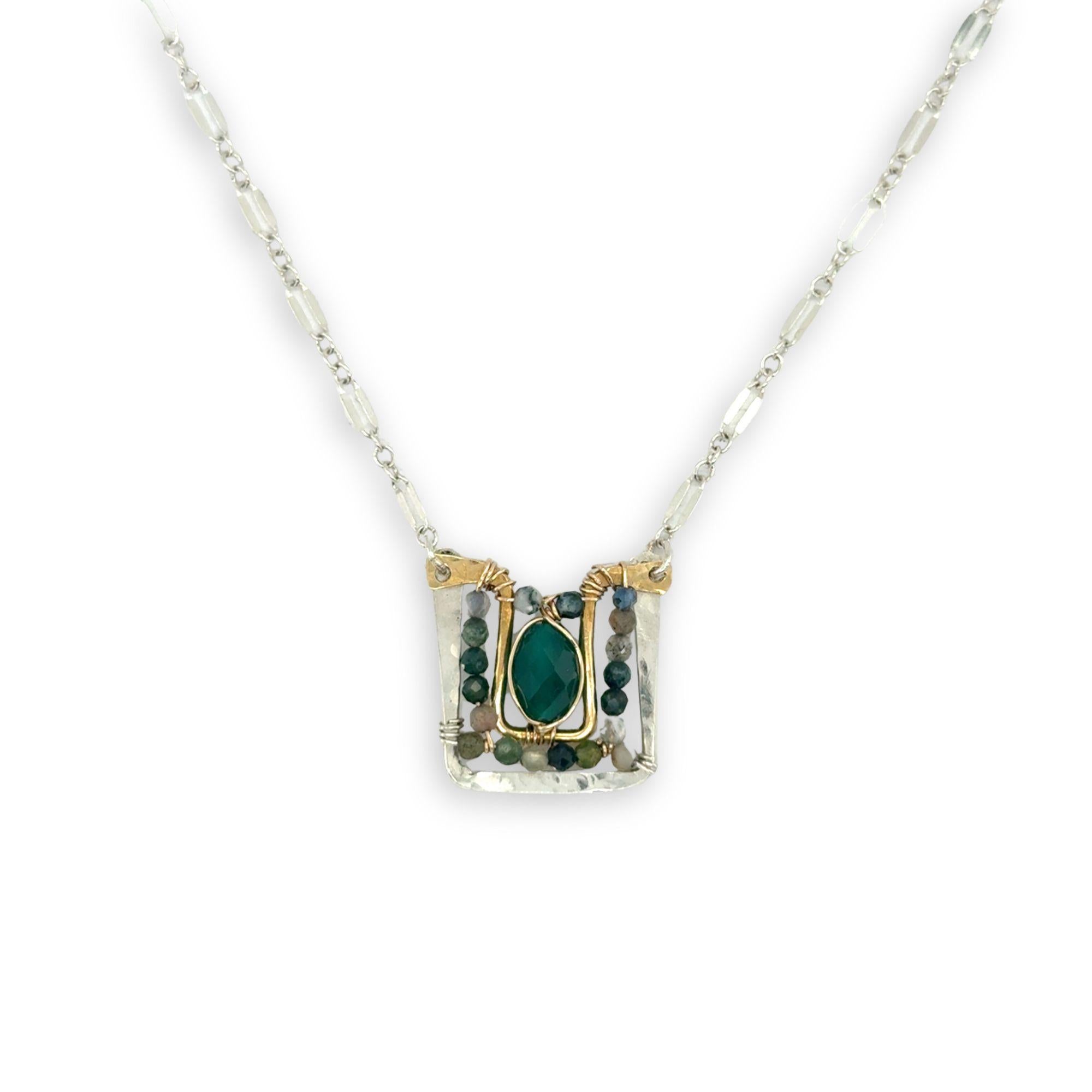 Sterling silver and brass hammered mini pendant holding green onyx and fancy jasper faceted gemstones on a sterling silver tube chain necklace