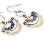 handmade brass fan mini earrings accented with lavender cubic zirconia and oxidized sterling silver twist wire handing from a textured sterling silver link