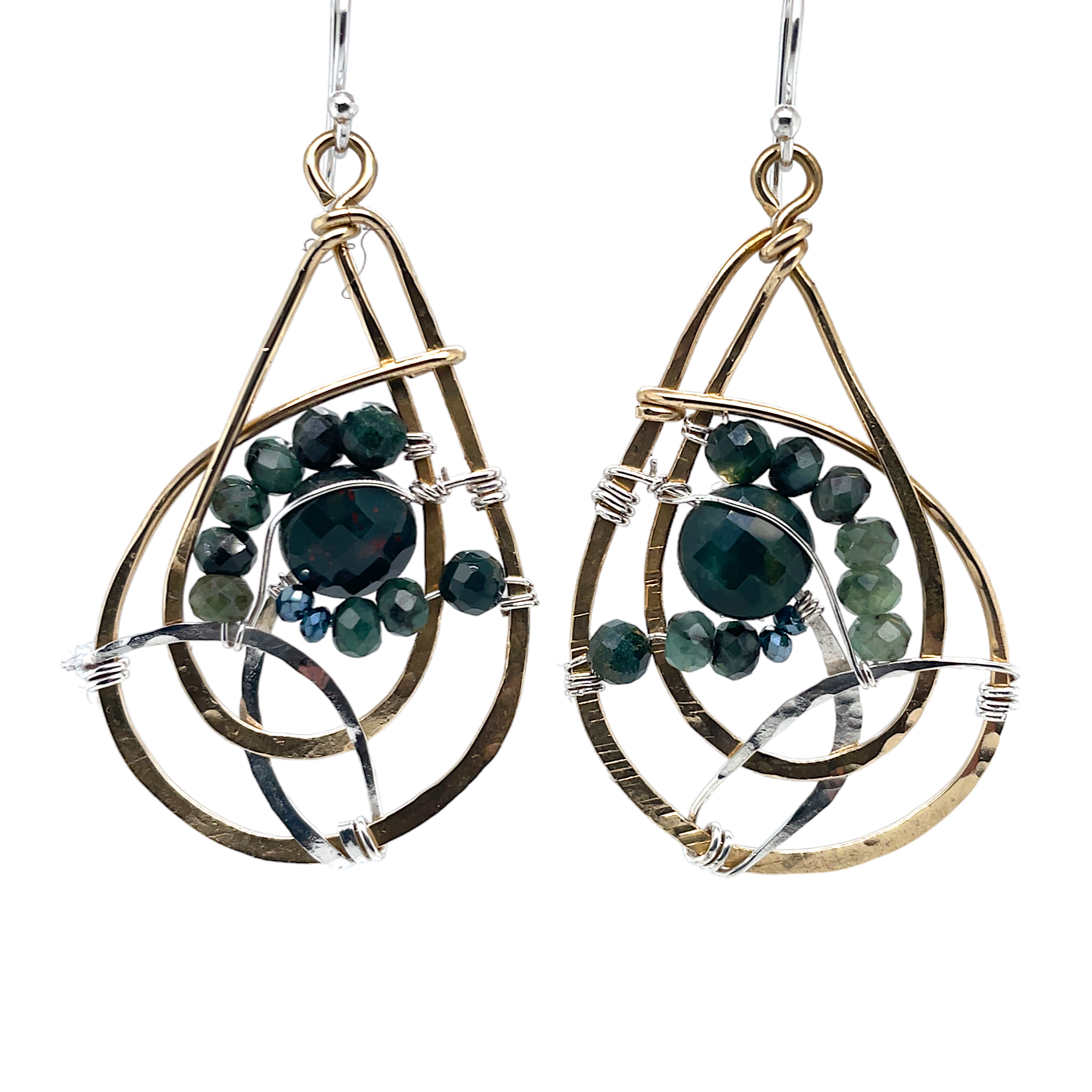 A pair of brass and sterling silver swirl earrings featuring faceted emeralds and blood stone gemstones