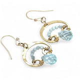 A pair of brass mini mushroom-shaped earrings with blue quartz gemstone drops and micro light blue cat's eye gemstones