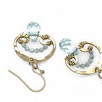 A pair of brass mini mushroom-shaped earrings with blue quartz gemstone drops and micro light blue cat's eye gemstones