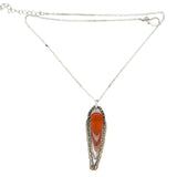 Smooth carnelian long drop with gold filled, sterling, and darkened sterling chain cascades on an arch or pyrite gemstones necklace