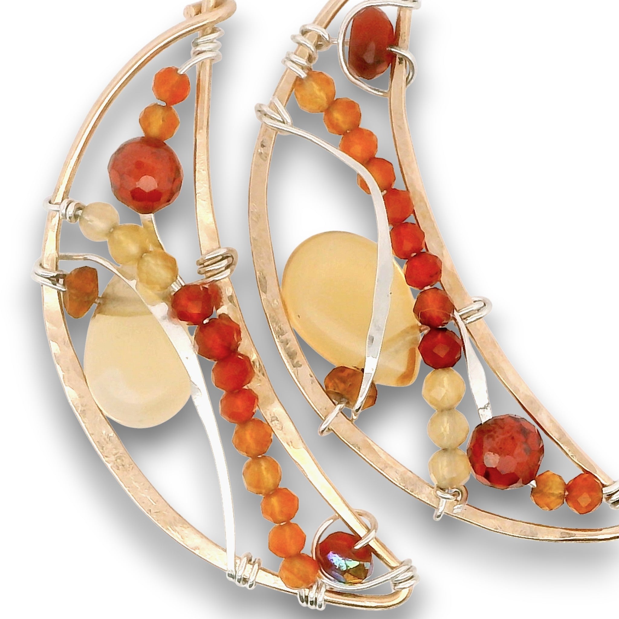 Bronze moon shaped earrings filled with carnelian, citrine, red cubic zirconia, and a citrine smooth teardrop on sterling silver wire