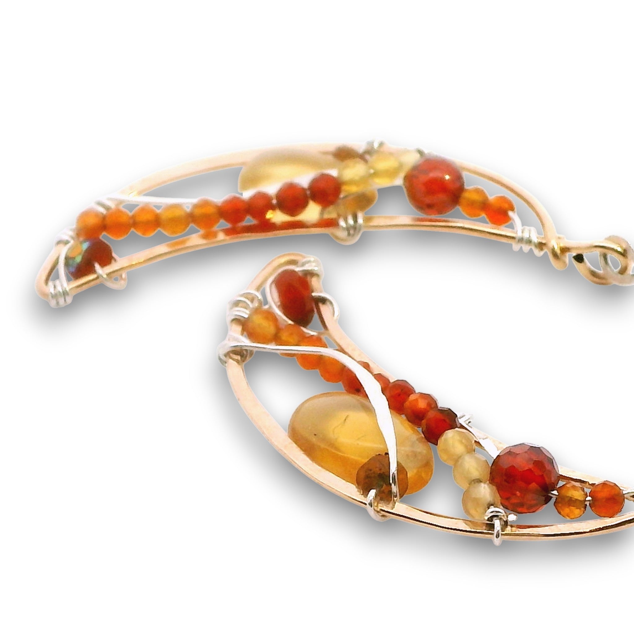 Bronze moon shaped earrings filled with carnelian, citrine, red cubic zirconia, and a citrine smooth teardrop on sterling silver wire