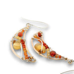 Bronze moon shaped earrings filled with carnelian, citrine, red cubic zirconia, and a citrine smooth teardrop on sterling silver wire