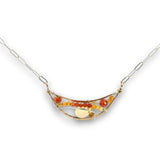 mini bronze moon pendant filled with a citrine teardrop, ombre carnelian mini gemstones, and cubic zirconia on sterling silver wire and oval chain necklace