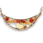 mini bronze moon pendant filled with a citrine teardrop, ombre carnelian mini gemstones, and cubic zirconia on sterling silver wire and oval chain necklace