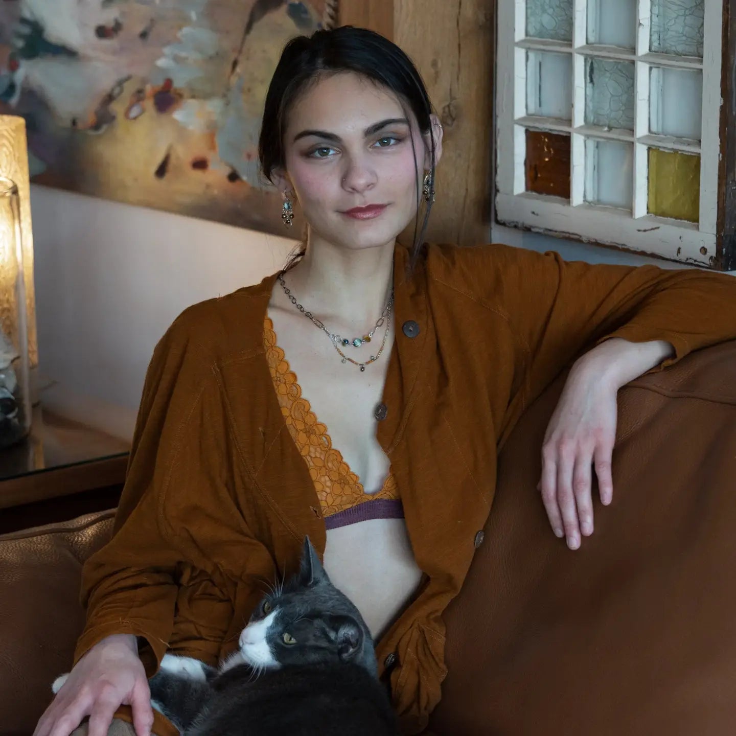 A double strand necklace with one strand featuring hammered brass and sterling silver handmade links and cat's eye faceted gemstones, and the other strand with faceted ombre mookaite and tiny pearl accents.