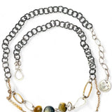 A double strand necklace with one strand featuring hammered brass and sterling silver handmade links and cat's eye faceted gemstones, and the other strand with faceted ombre mookaite and tiny pearl accents.