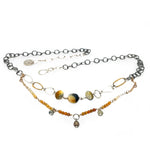 A double strand necklace with one strand featuring hammered brass and sterling silver handmade links and cat's eye faceted gemstones, and the other strand with faceted ombre mookaite and tiny pearl accents.