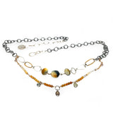 A double strand necklace with one strand featuring hammered brass and sterling silver handmade links and cat's eye faceted gemstones, and the other strand with faceted ombre mookaite and tiny pearl accents.