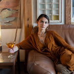 handmade hammered marquise links mixed with cat's eye gemstones, sparkly sterling silver links, and sterling silver chain form a long necklace