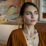 handmade hammered marquise links mixed with cat's eye gemstones, sparkly sterling silver links, and sterling silver chain form a long necklace