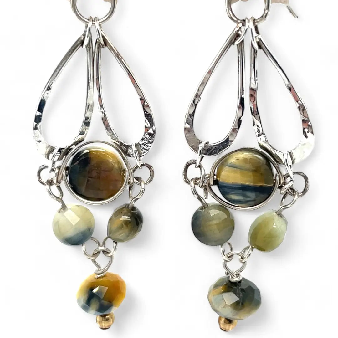 A pair of sterling silver chandelier earrings with cat's eye cut gemstones in various colors