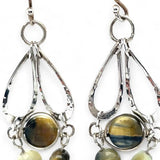A pair of sterling silver chandelier earrings with cat's eye cut gemstones in various colors