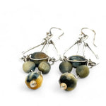 A pair of sterling silver chandelier earrings with cat's eye cut gemstones in various colors