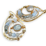 Brass drop earrings with light blue silver fresh water pearl coins, blue lace agate, blue crystal, and aquamarine gemstone earrings