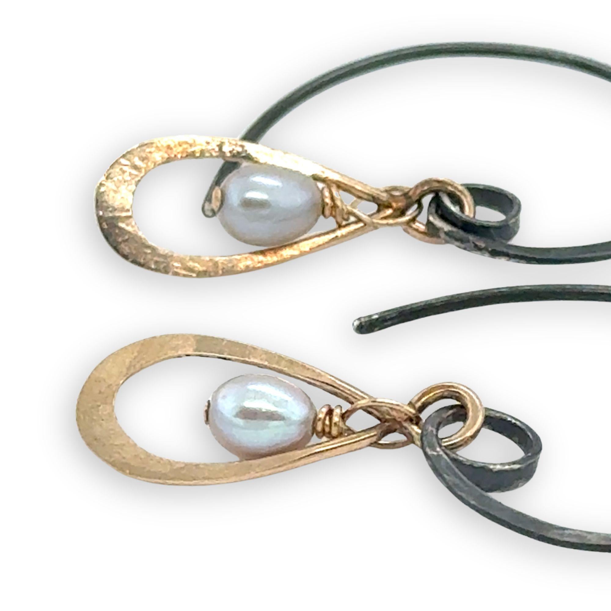Pair of earrings with bronze mini teardrops on handmade oxidized hoop hooks with silver fresh water pearl charms