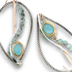 Oxidized sterling silver twist drop earrings with chalcedony gemstones set in gold filled wire with emerald gemstones and sterling silver accents