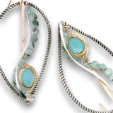 Oxidized sterling silver twist drop earrings with chalcedony gemstones set in gold filled wire with emerald gemstones and sterling silver accents