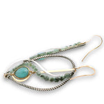 Oxidized sterling silver twist drop earrings with chalcedony gemstones set in gold filled wire with emerald gemstones and sterling silver accents