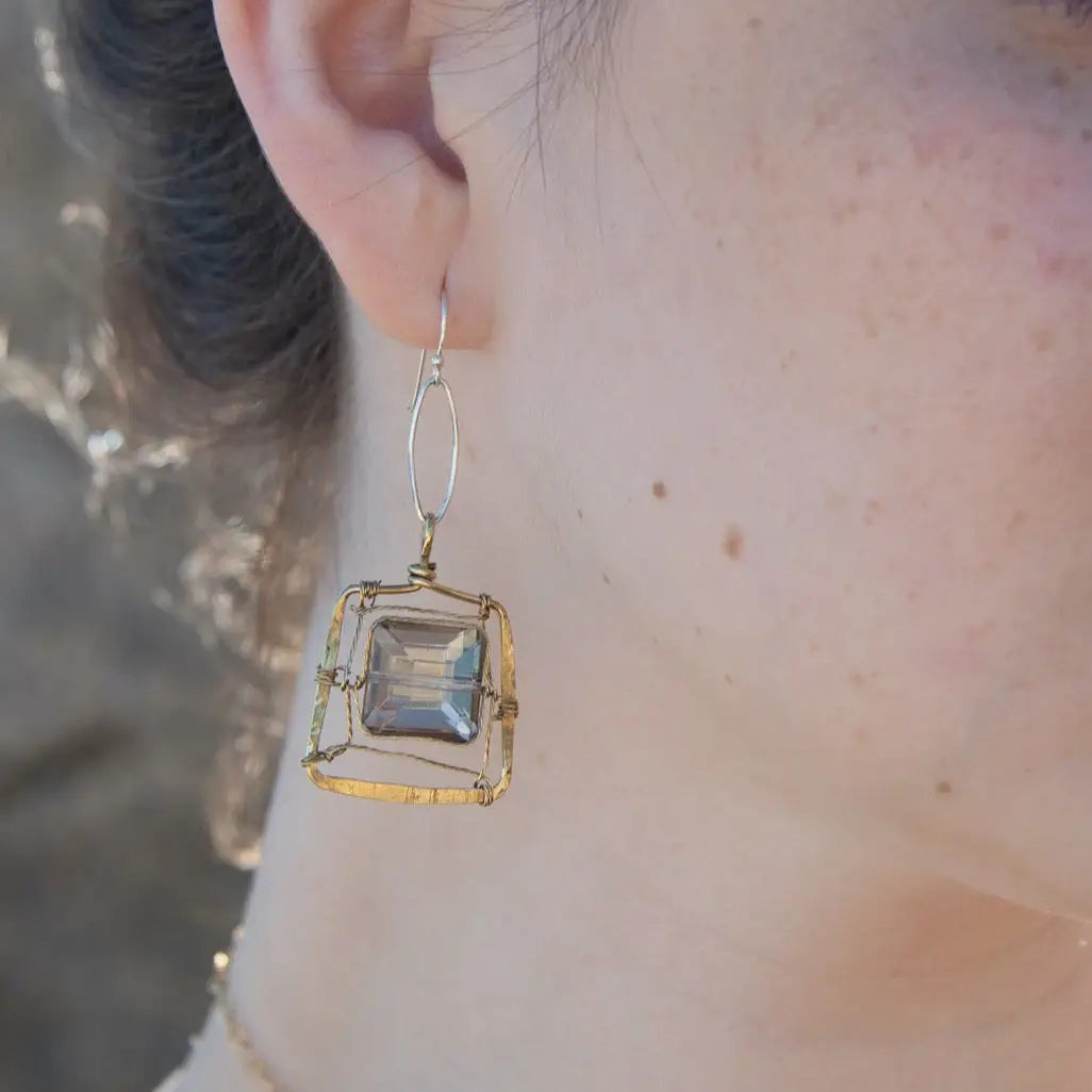 Champagne crystal tiles held in brass twist wire within a brass hammered square earring frame hanging from a sterling silver marquise link