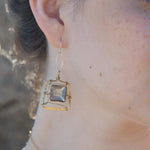 Champagne crystal tiles held in brass twist wire within a brass hammered square earring frame hanging from a sterling silver marquise link