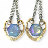 Handmade leaf stamped brass chariots hanging from double up oxidized sterling silver dainty chain, holding a blue faceted hexagonal crystal earring