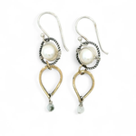 Brass hammered teardrops hanging from oxidized braided sterling rings holding a round fresh water pearl and faceted aquamarine earrings