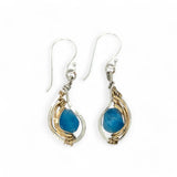 singular faceted apatite gemstone is held in layers of hammered gold filled wire on mini sterling silver paisley earrings