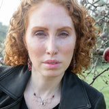 oxidized sterling silver skinny drop earrings with hammered bronze wire, smooth ruby nuggets, pink tourmaline, and garnet gemstones on gold filled wire