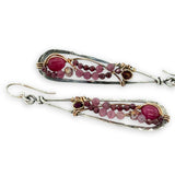 oxidized sterling silver skinny drop earrings with hammered bronze wire, smooth ruby nuggets, pink tourmaline, and garnet gemstones on gold filled wire