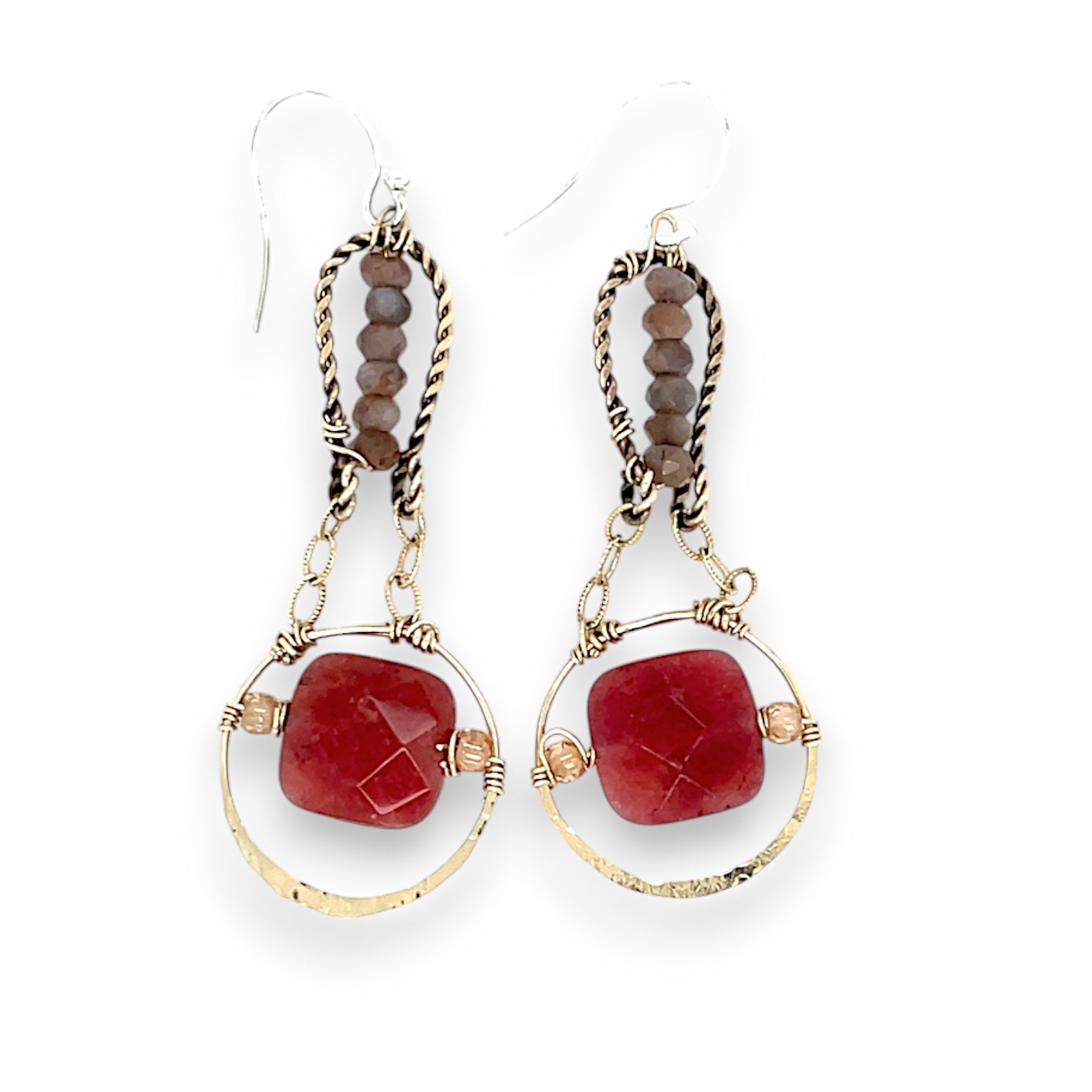 A pair of earrings featuring red quartz faceted tiles, gold-filled hoops, and mauve moontstone gemstones, with gold-filled chains and twisted brass tops,