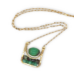 Chrysoprase smooth and faceted gemstones fill a brass mini box pendant necklace
