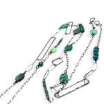 Handmade darkened sterling silver rectangle and diamond links interspersed with sparkly diamond cut links, teal crystal, and chrysoprase gemstones to form this long necklace that can be worn at any length