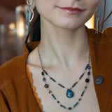 double strand darkened sterling silver necklace with chrysocolla, chocolate fresh water pearl, striped brown agate, and a chrysocolla faceted gemstone drop