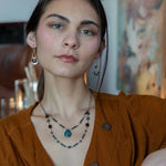 double strand darkened sterling silver necklace with chrysocolla, chocolate fresh water pearl, striped brown agate, and a chrysocolla faceted gemstone drop