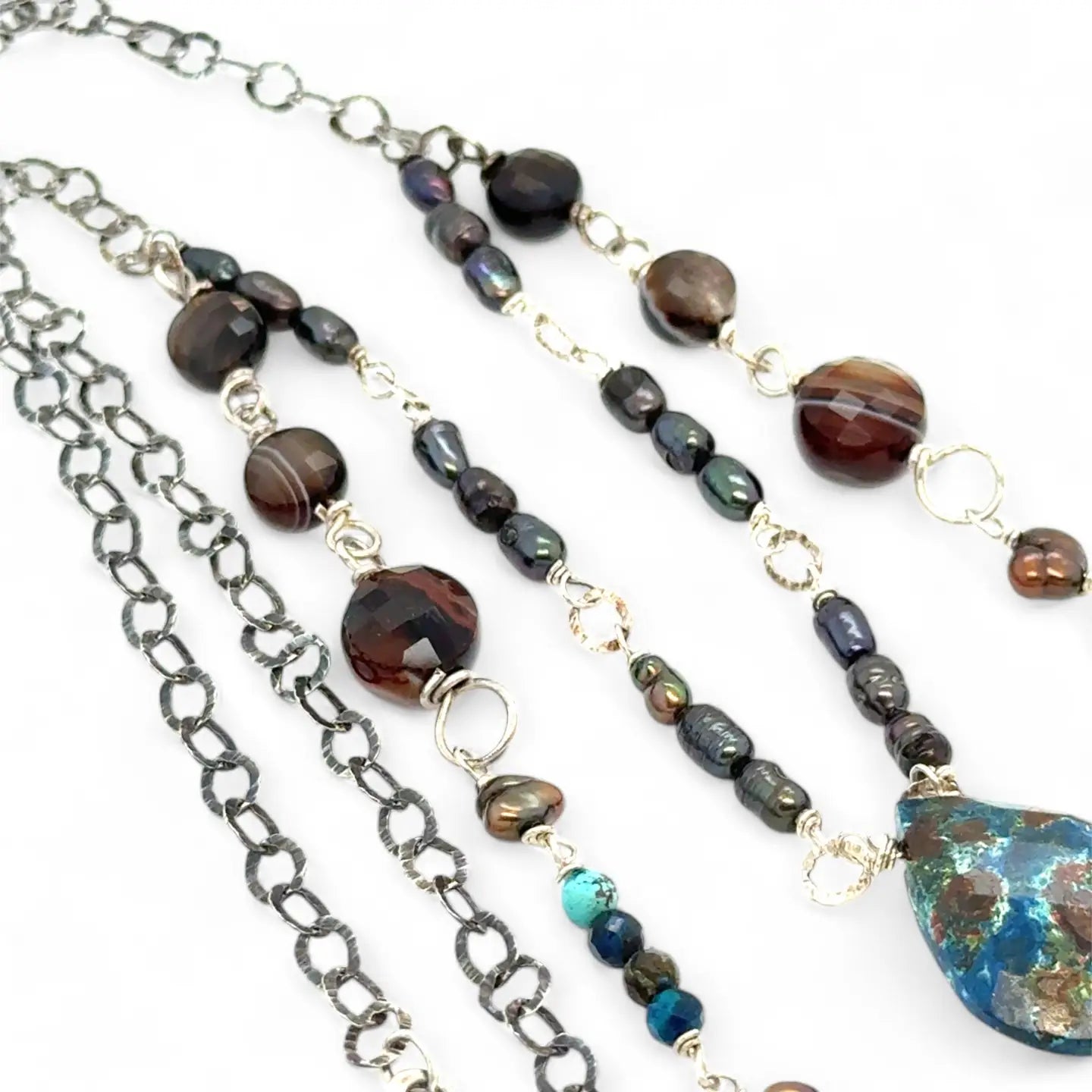 double strand darkened sterling silver necklace with chrysocolla, chocolate fresh water pearl, striped brown agate, and a chrysocolla faceted gemstone drop