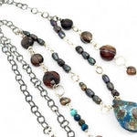 double strand darkened sterling silver necklace with chrysocolla, chocolate fresh water pearl, striped brown agate, and a chrysocolla faceted gemstone drop