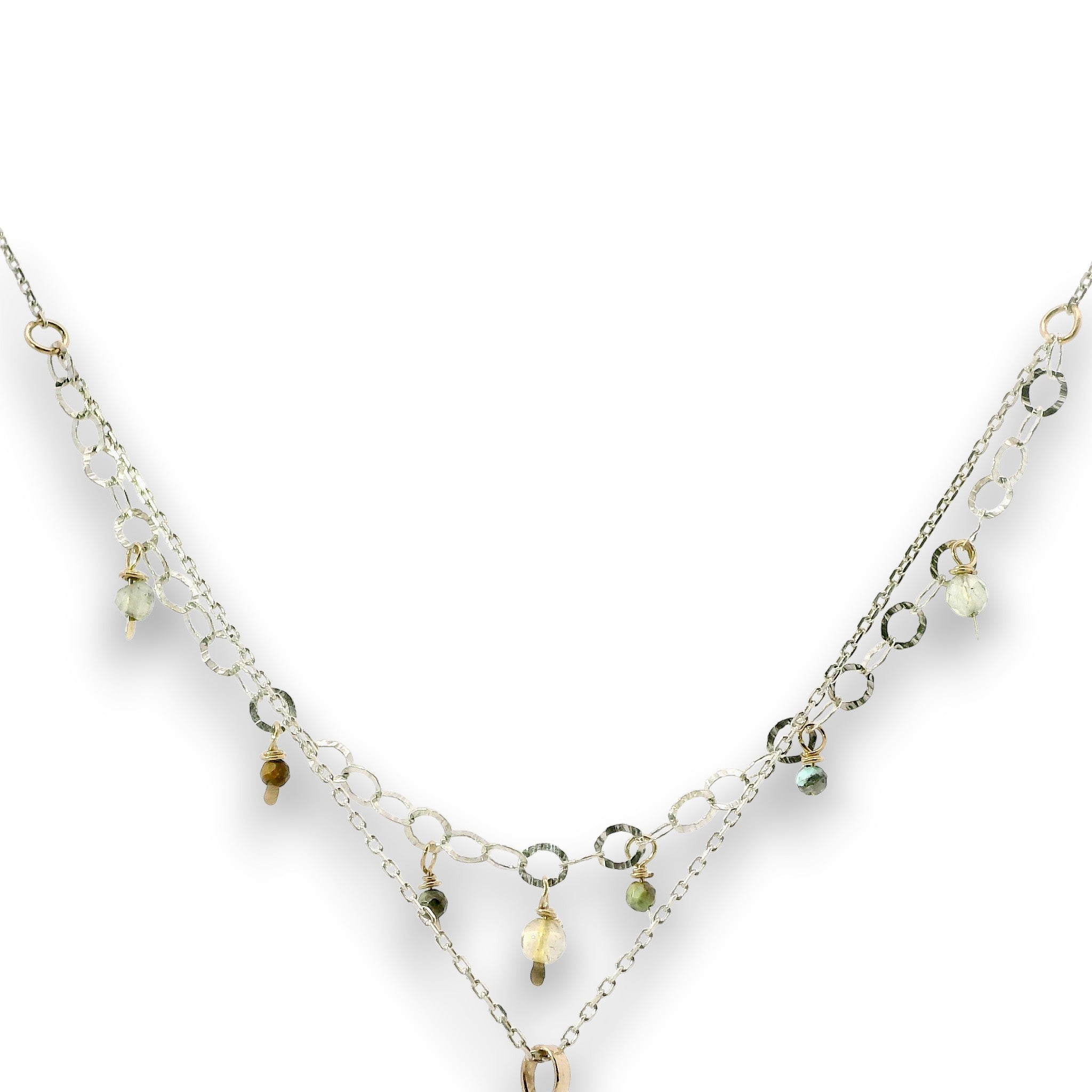 a double layered necklace, the first layer with a Bronze marquise pendant embellished with a faceted citrine coin, prehnite, and turquoise gemstones on sterling silver wire, and the second layer with delicate gemstone charms
