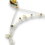 a double layered necklace, the first layer with a Bronze marquise pendant embellished with a faceted citrine coin, prehnite, and turquoise gemstones on sterling silver wire, and the second layer with delicate gemstone charms