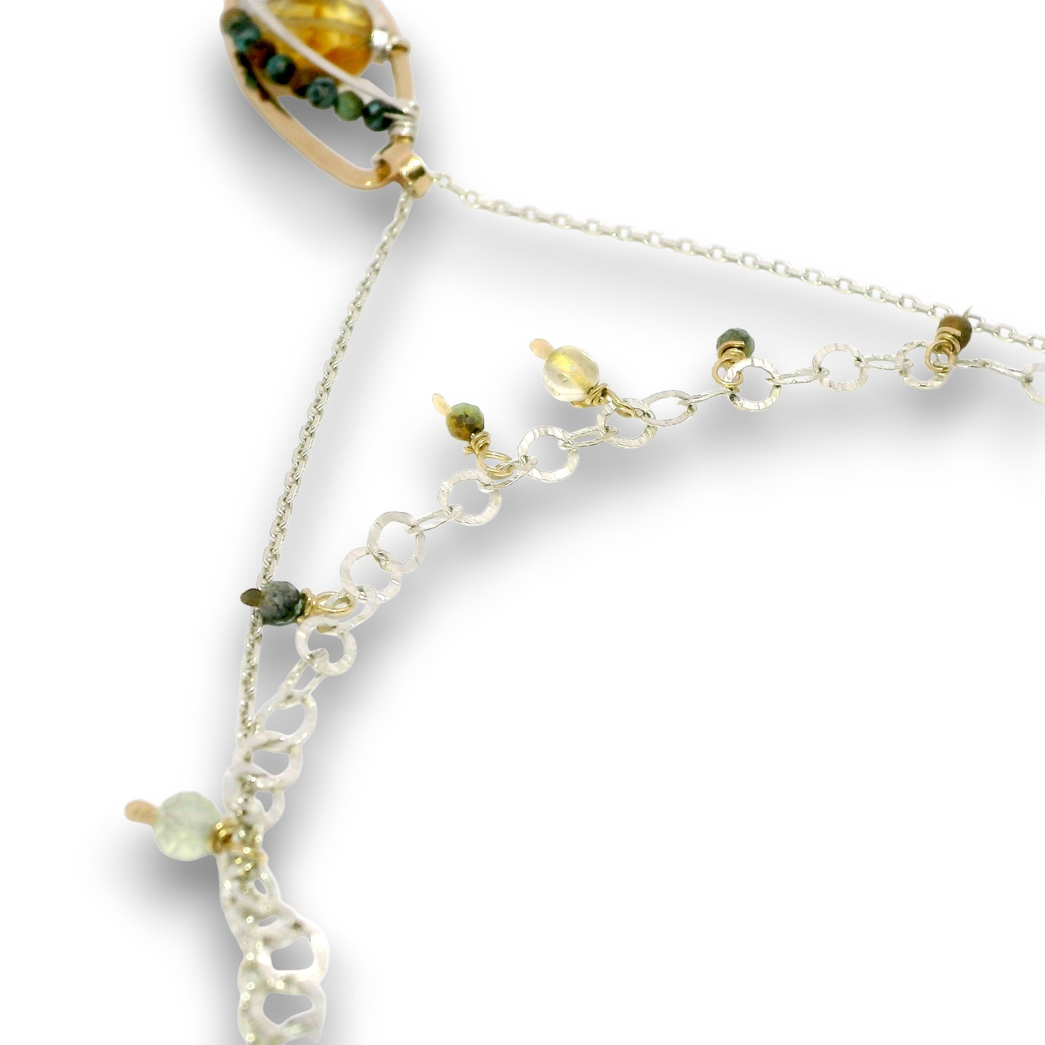 a double layered necklace, the first layer with a Bronze marquise pendant embellished with a faceted citrine coin, prehnite, and turquoise gemstones on sterling silver wire, and the second layer with delicate gemstone charms